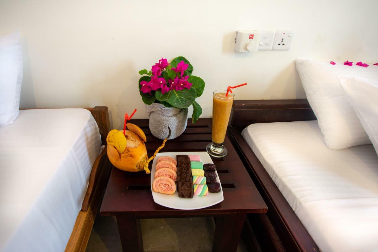 The Surf Access Guest House Baía de Arugam Exterior foto